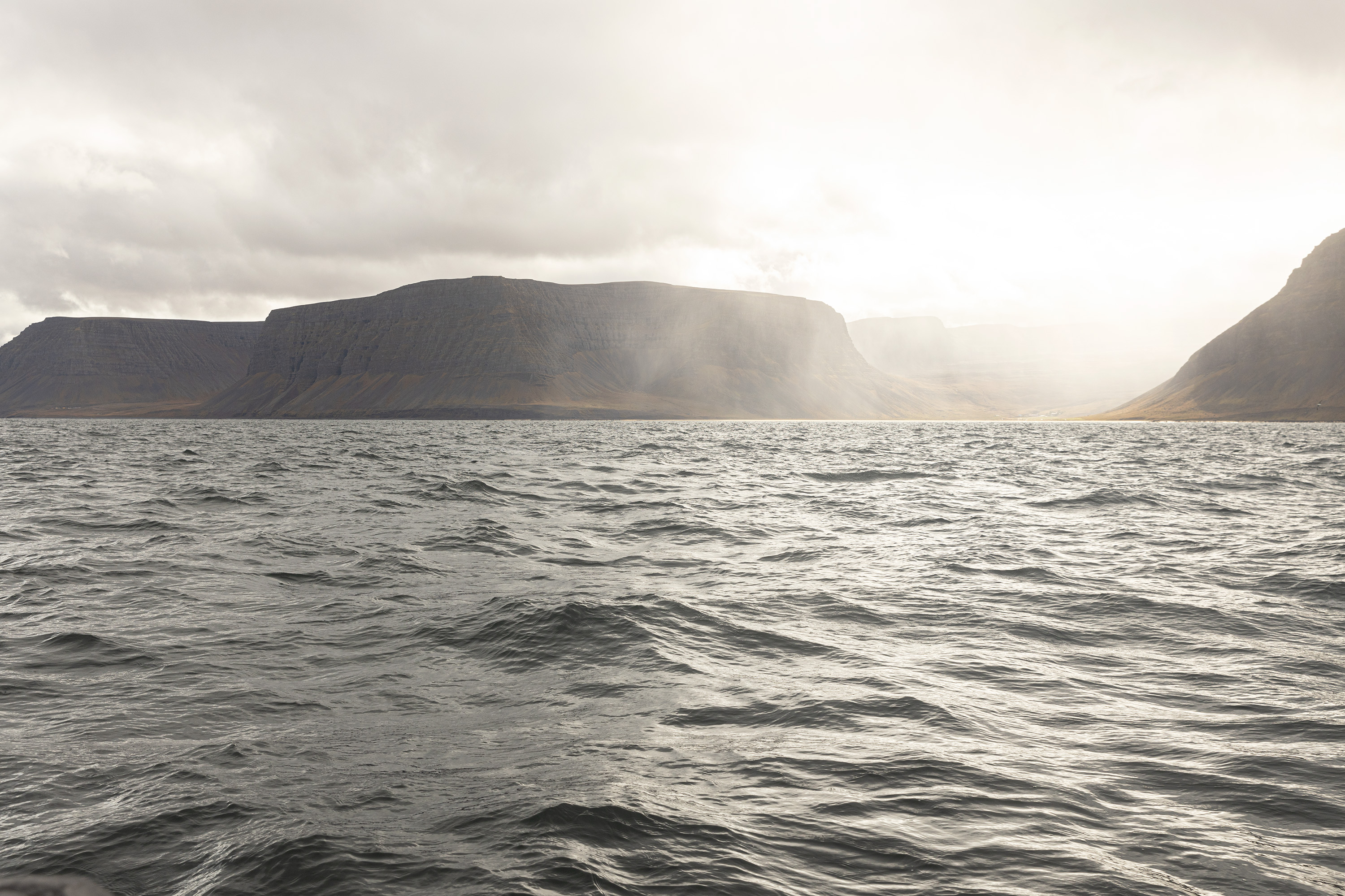 A picture of the sea and mountains